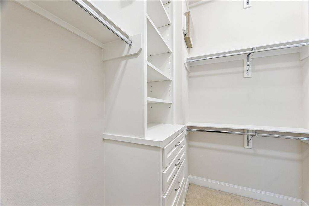 Custom built-ins in the closet designed to make storage a breeze, keeping your space organized and efficient