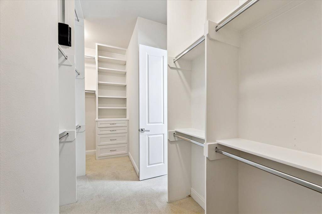 Not one, but two primary closets—talk about convenience! Ample space for all your wardrobe needs, keeping everything organized and within reach