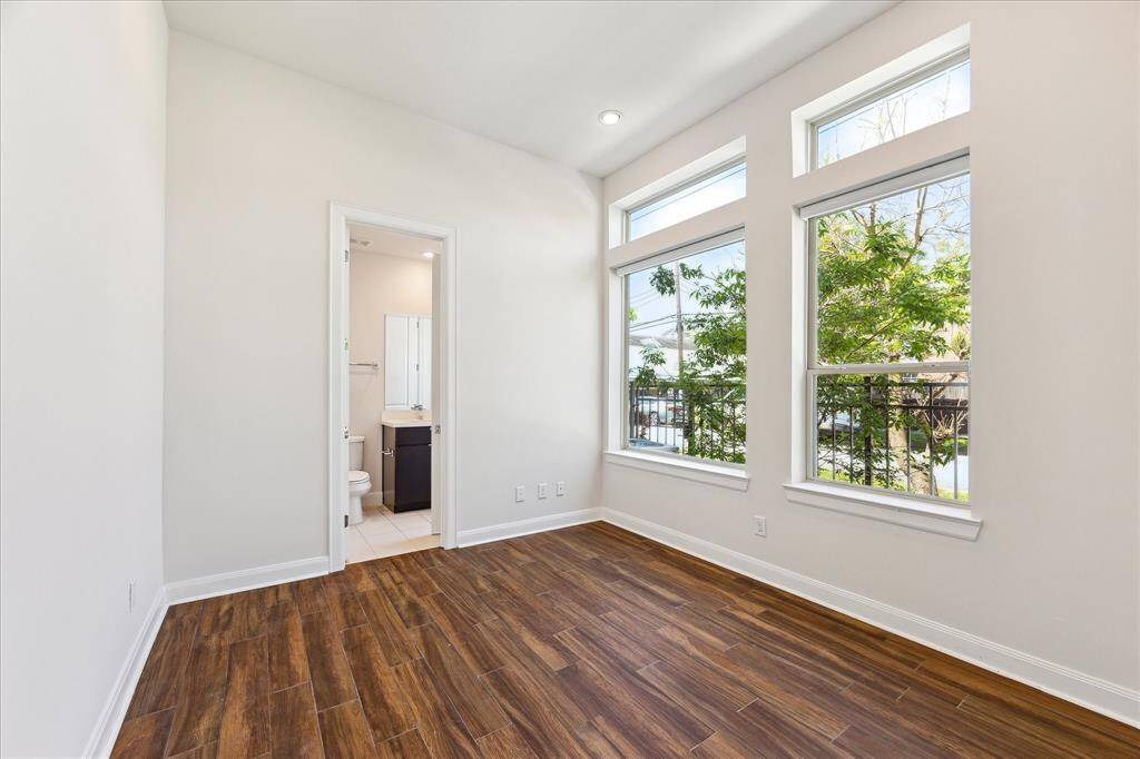 Versatile first-floor bedroom that doubles perfectly as a home office or guest suite