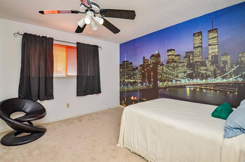 Third bedroom with a walk-in closet.