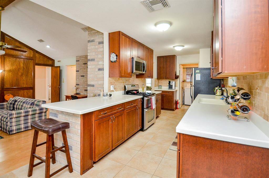 The kitchen overlooks the living area.