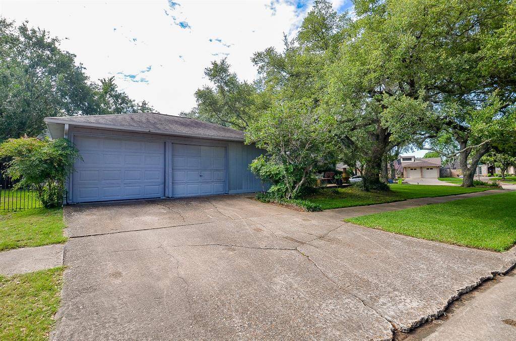 Oversized garage with room for extra parking in the driveway.