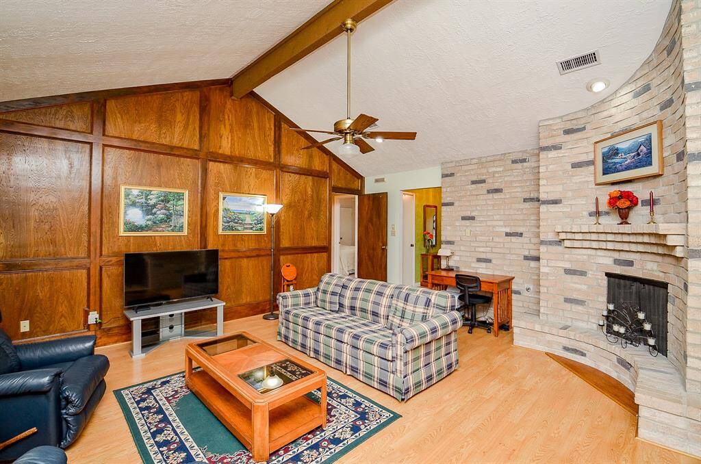 The living area has custom moulding.