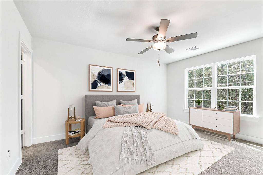 Virtual staging of primary bedroom.