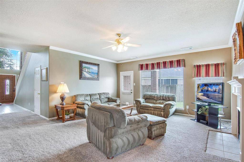 Elegant sitting room with open layout, perfect for relaxation and entertainment.