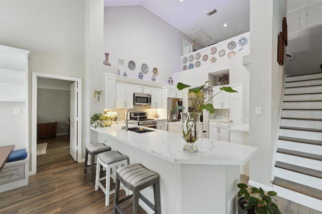 New cabinets and quartz countertops! The sky light brings in plenty of natural light.