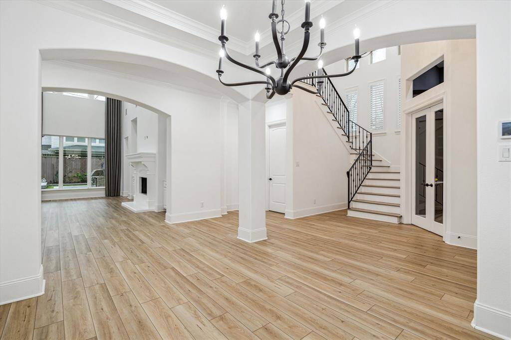 A view of the dining room overlooking the living room and entry foyer.