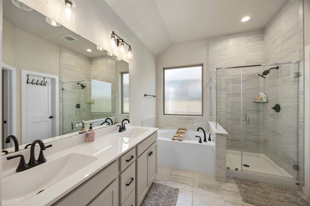Large vanity and open area for a shared bathroom.
