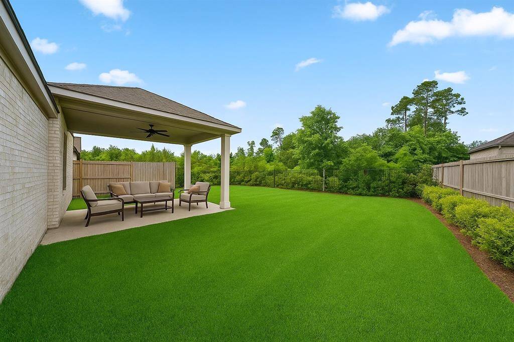 Edited photo to show a rendering of a possible larger patio addition.