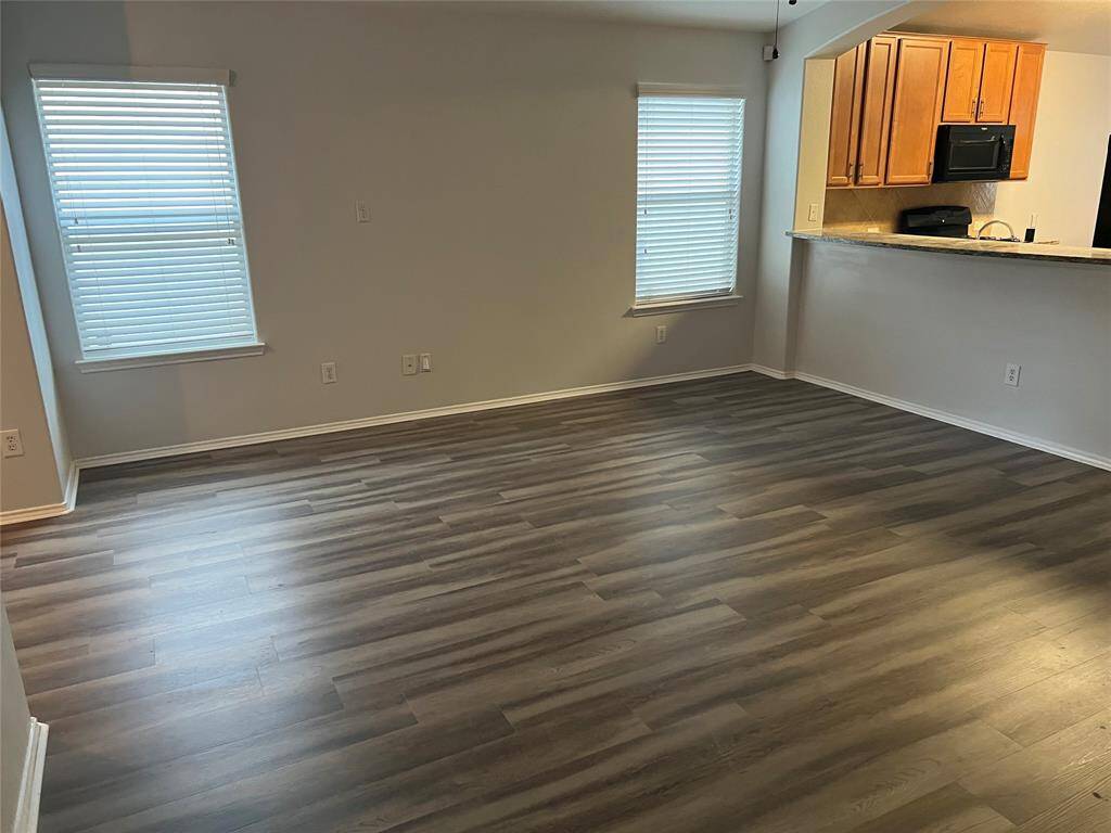 Notice the wall of windows with natural lighting.