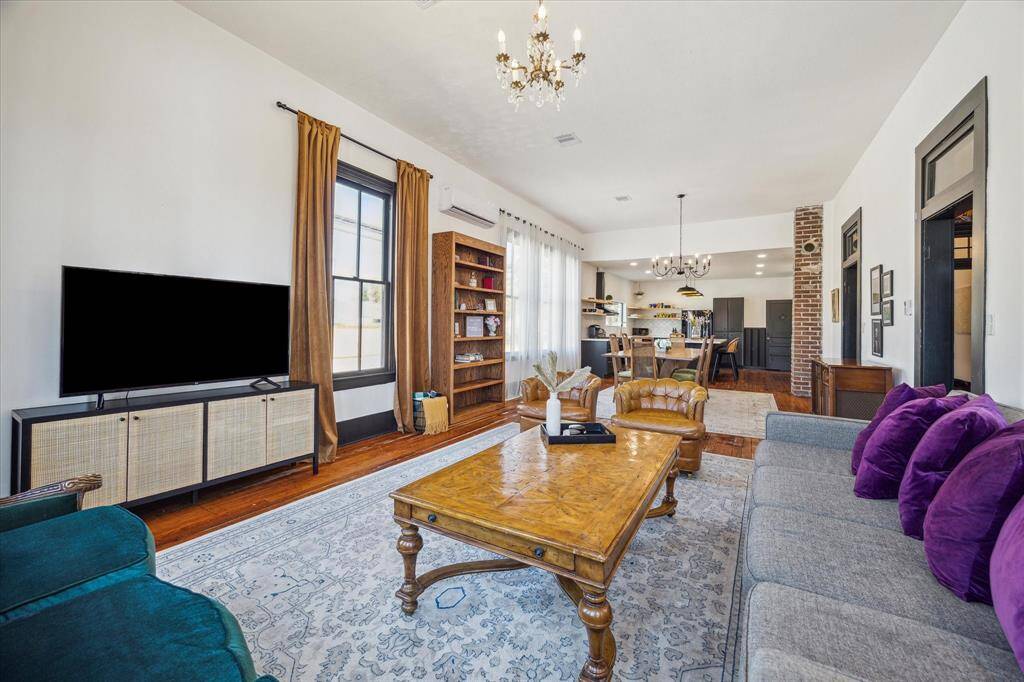 Another angle of the open-concept living and dining spaces