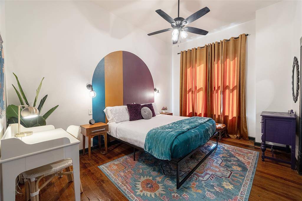 A second bedroom is located near the front of the house and shares the ensuite bathroom