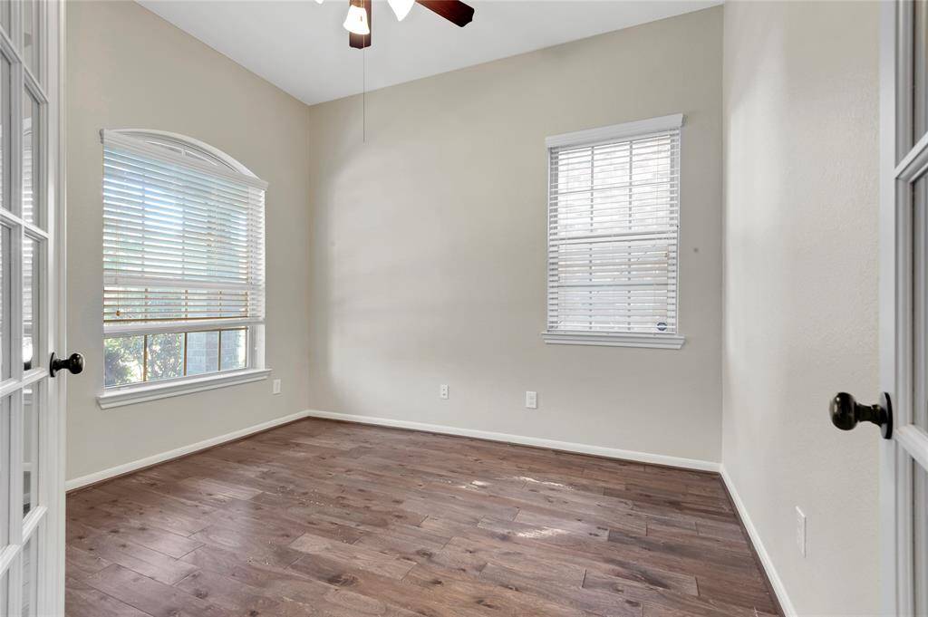 This 3 bedroom PLUS a study home has a wonderful layout including this private up front study with frnwch doors and wood fooring.