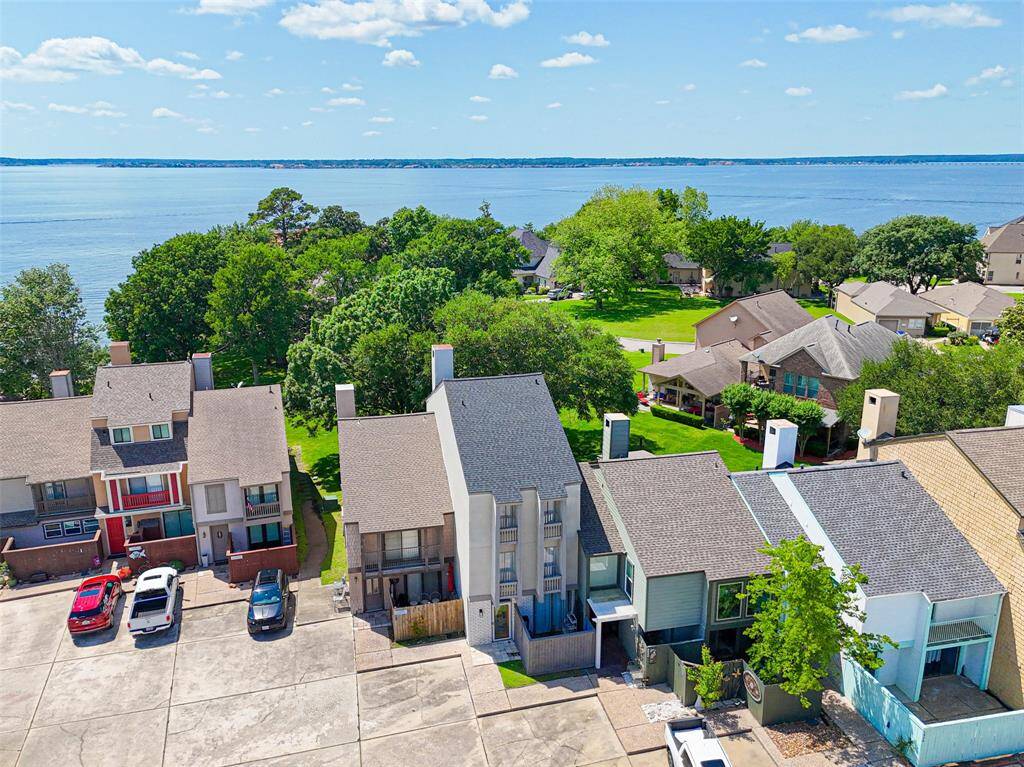 Charming waterfront townhouses with modern designs, nestled in a serene community. Enjoy stunning lake views, lush greenery, and easy access to outdoor activities. Perfect for those seeking a peaceful, scenic lifestyle.