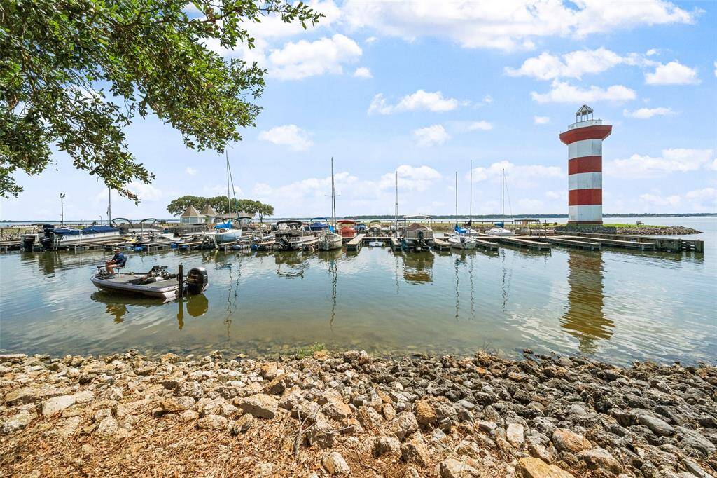 The calm cove of this marina offers easy docking of your water toys even when the water are more rough in the open water.  The setting offers a peaceful waterfront view, ideal for boating enthusiasts or those seeking a serene lake life lifestyle.