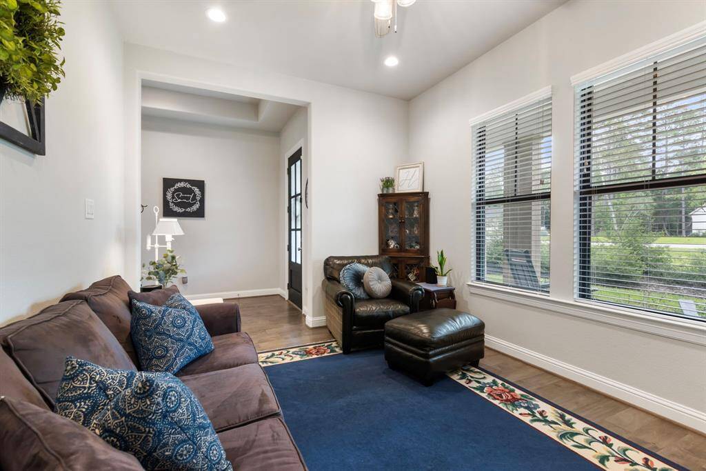 Flex room located to the left when you walk in.  This could be set up as Den, a lounge for entertaining or a home office