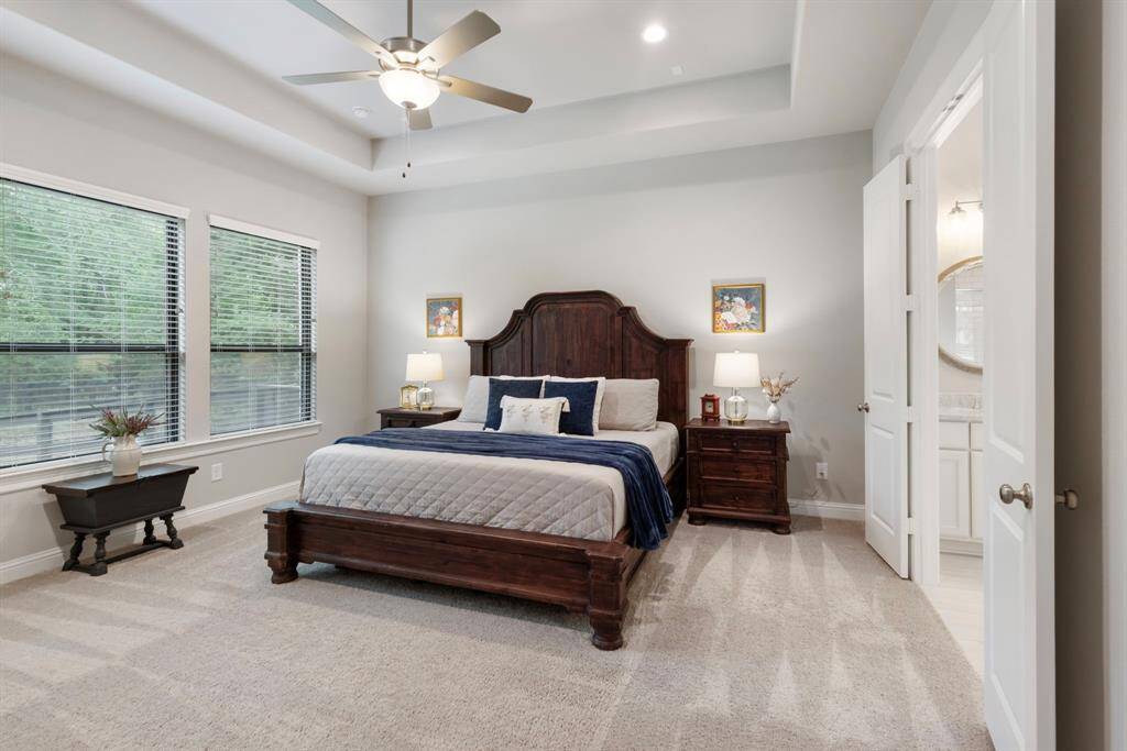 Spacious Primary Bedroom with full double doors into the primary bath.