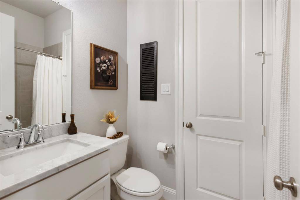 Bathroom that is connecting to Guest Room 3 but also to the hallway for guests