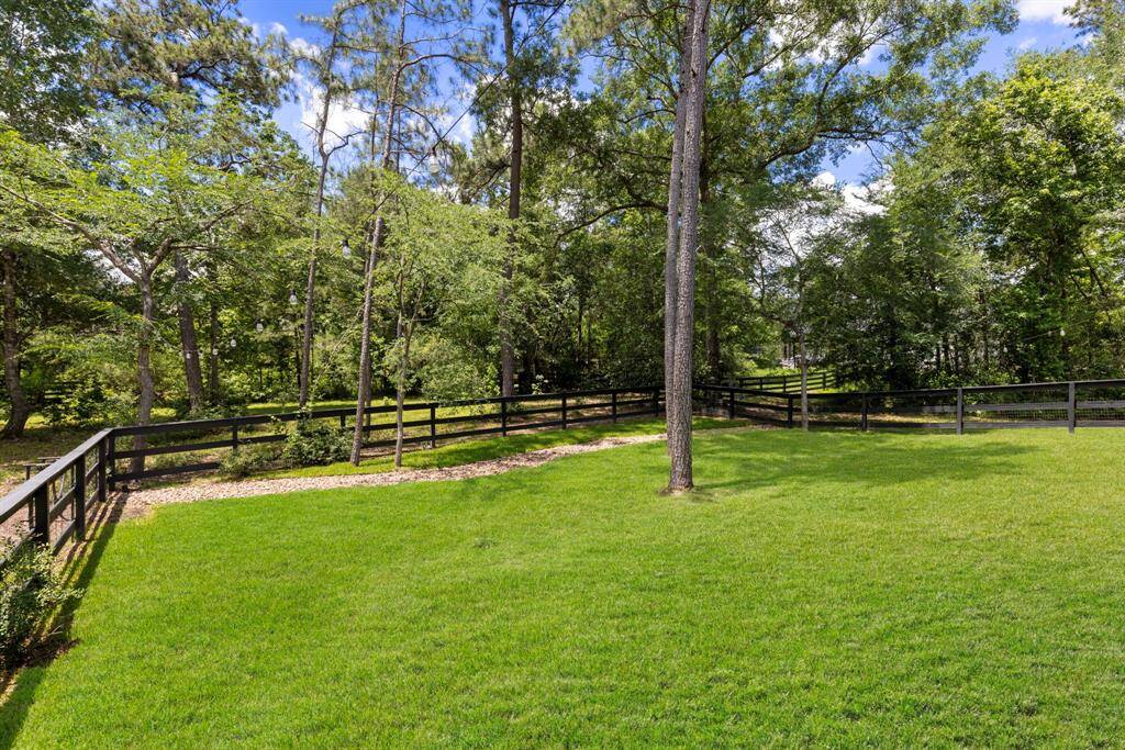 A portion of the lot is fenced to keep those furry friends safe.