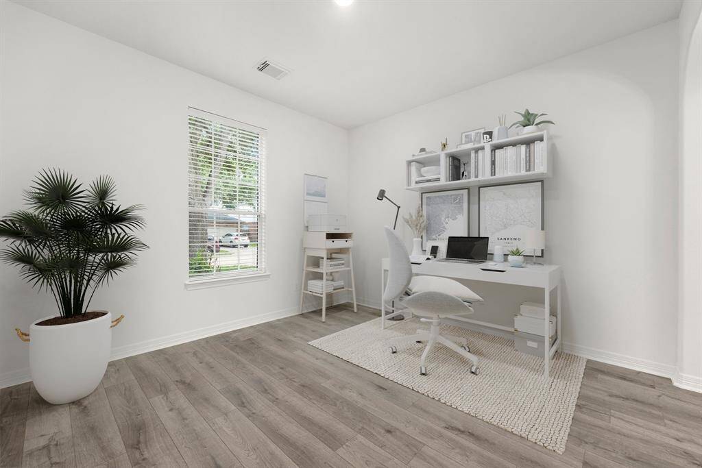 Gather the family and guests together in your lovely living room, or bonus office space! Featuring soaring high ceilings, recessed lighting, fresh paint, gorgeous luxury vinyl plank floors and large windows that provide plenty of natural lighting throughout the day.