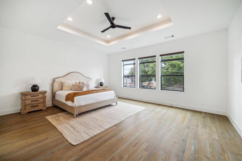 Your retreat awaits—spacious and serene, the primary suite is bathed in natural light and features an oversized space overlooking the backyard - perfect for sunset lounging or Sunday morning journaling.