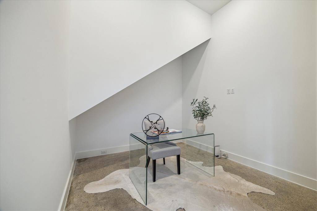 First floor home office is the perfect WFH space. This could also easily serve as a yoga room, art studio, or childs playroom on the first floor.