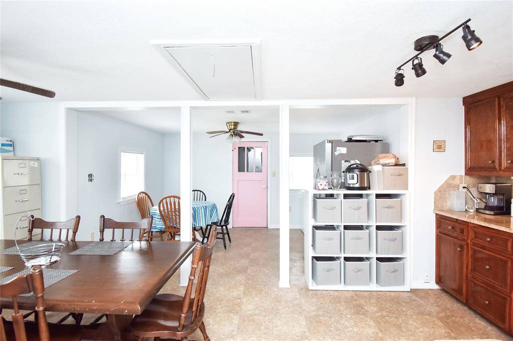 The spacious open kitchen and dining area offers the perfect setting to cook, entertain, and make lasting memories with family and friends.