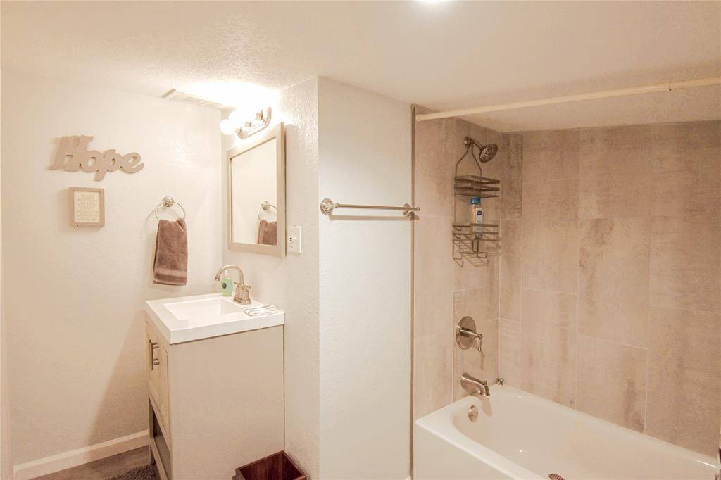 This beautifully renovated ensuite bathroom offers modern style and convenience- perfectly connected to a private bedroom retreat.