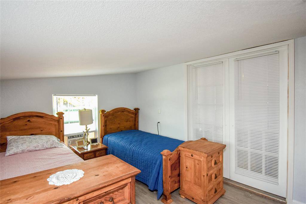 Located just off the living room, this versatile room enhances the home’s thoughtful layout- making the most of every inch with style and function.