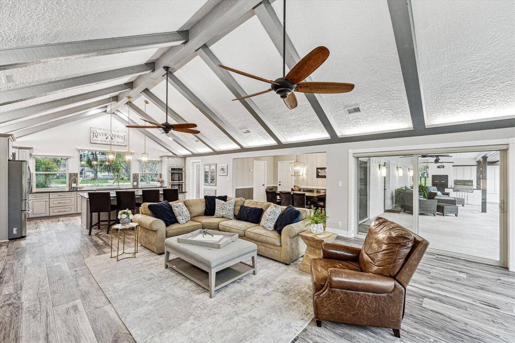 What a beautiful space to welcome friends and family into your home. Invite them inside to find a home filled with beautiful features that encourage them to come in and stay a while .