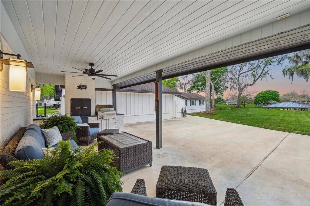 Whether you're hosting lively gatherings or seeking tranquility after a long day, this covered patio with stunning views promises to provide the perfect space where memories are made and stress melts away.