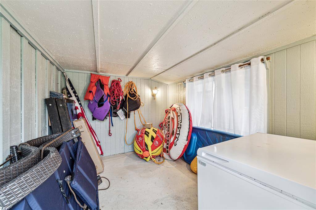 Fantastic dedicated extra storage space on the back of the garage. Perfect for all your water gear, toys, and extra fridge or freezer space.