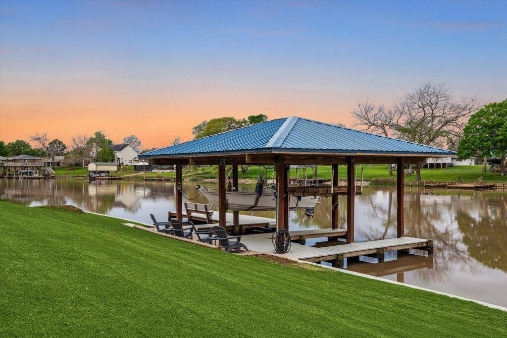 Enjoy boating, fishing, and quiet evenings relaxing by the water. This boat slip has been improved with dusk to dawn lighting, and the suspension system for the lift.