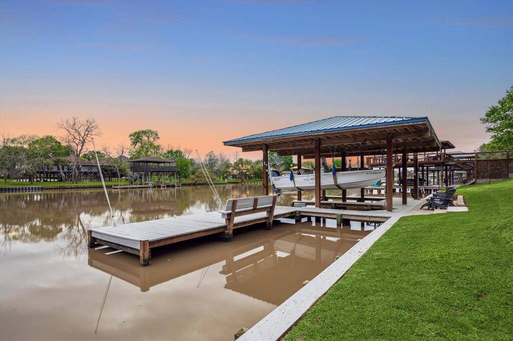 Enjoy morning coffee while you fish from your own backyard dock. Also note, there is approximately 125 feet of bulkhead.