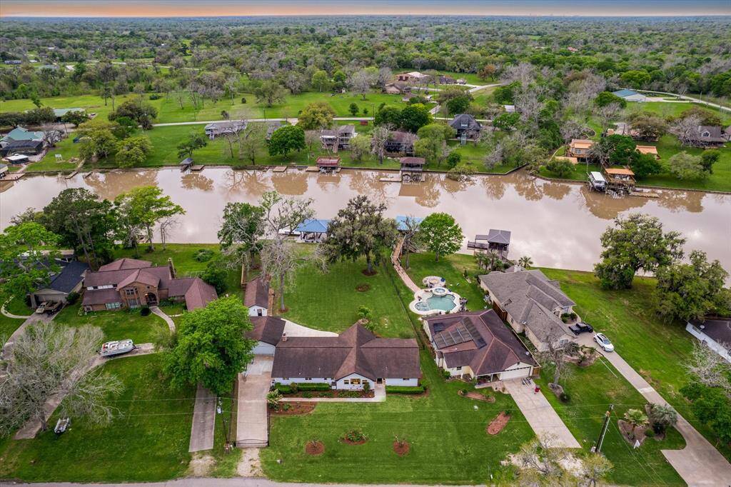 This fabulous property is located in the water-loving community of Holiday Shores. Here, you'll find friendly neighbors and a laid-back environment perfect for relaxing and embracing the water-front lifestyle. The sunset is one of the most stunning you will witness!!
