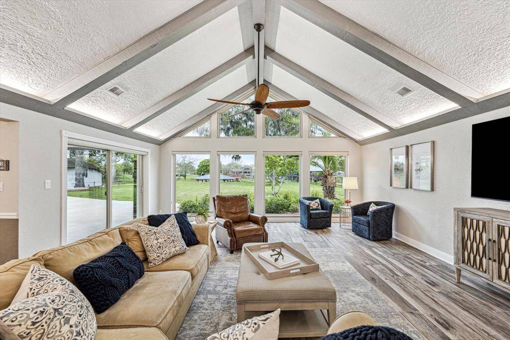 This fabulous family room is a great space to gather and visit with your friends and family or enjoy a quiet, peaceful evening at home with your favorite person.