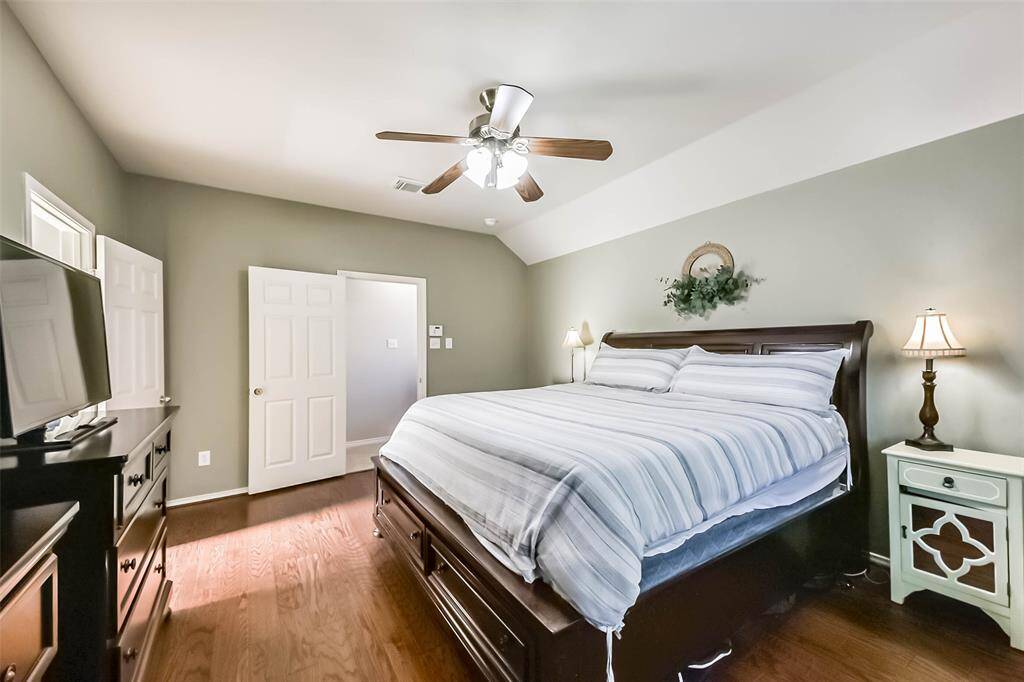 Spa-like ensuite with double sink vanity, soaking tub and a walk-in shower.