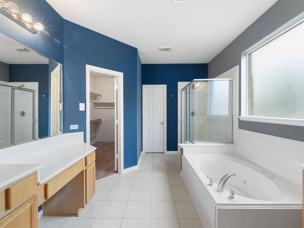 Primary bath, seperate shower with a soaking tub