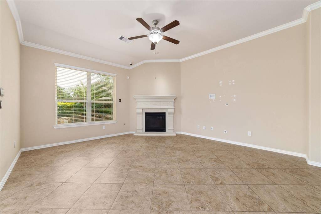 Large living room with large windows looking out to your amazing backyard.