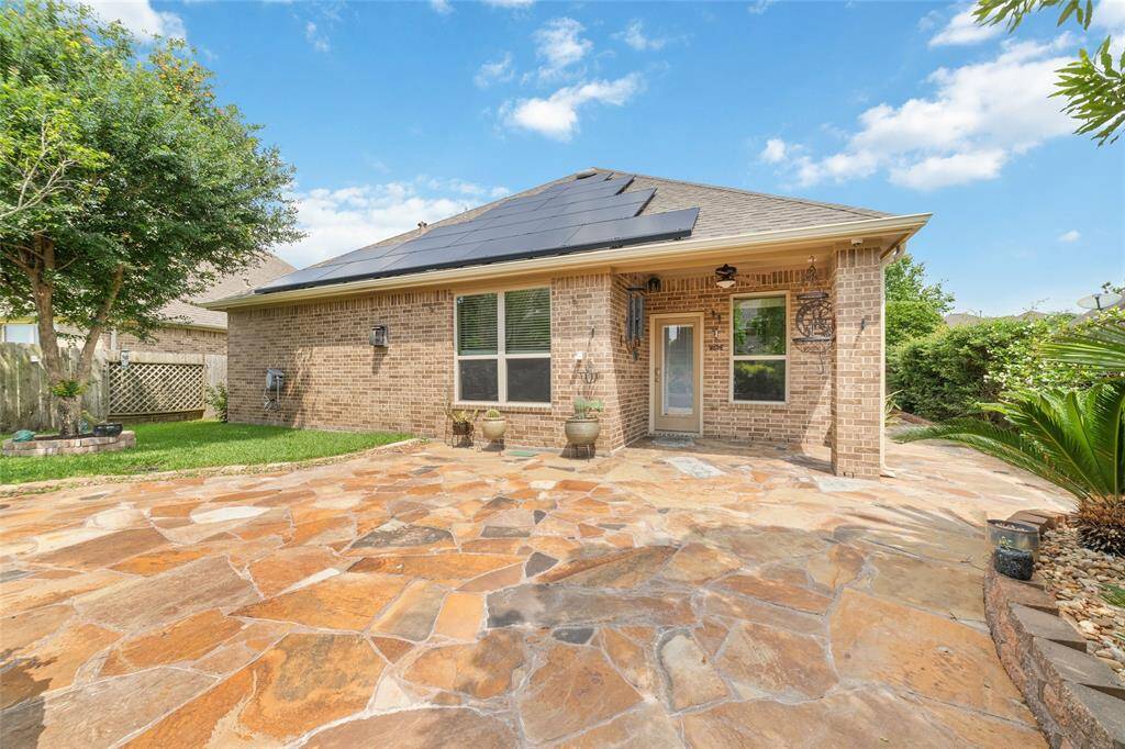 Amazing savings with this home on your electric bill with solar panels that you don't have to pay for!  Fully bricked home such a nice feature of the home.  Extended side yard with walkway.