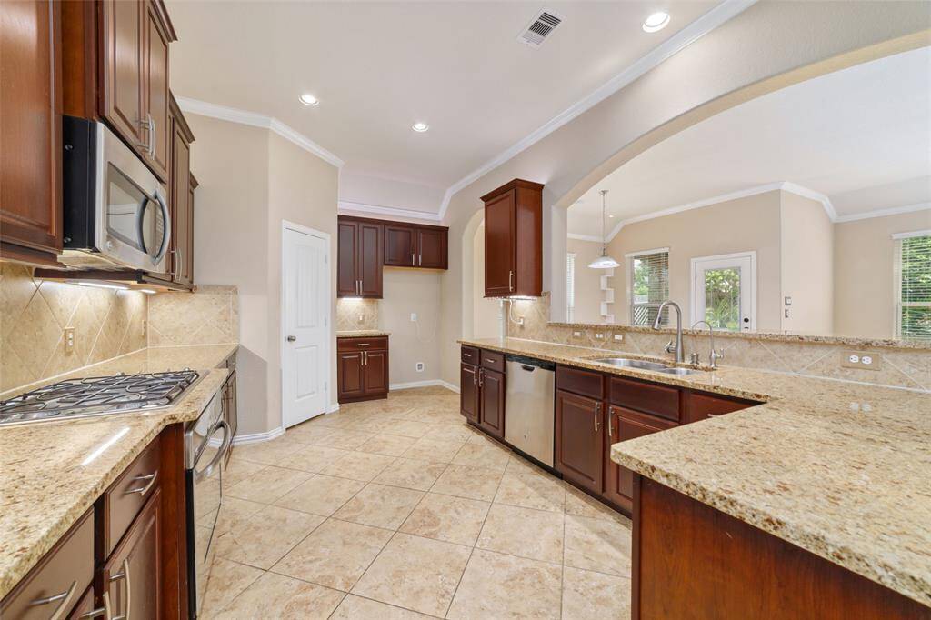 Look at all this counter space!  This is a chefs dream!  Nice open floorplan perfect for entertaining.