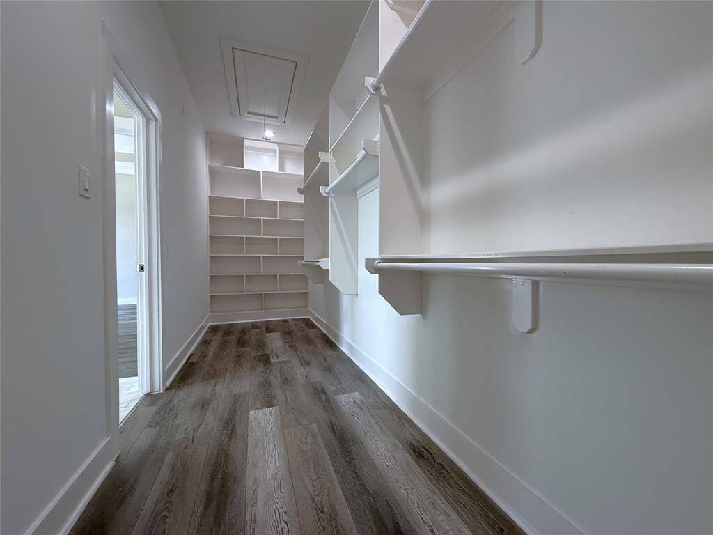 With built-in shelving, the walk-in closet is large!