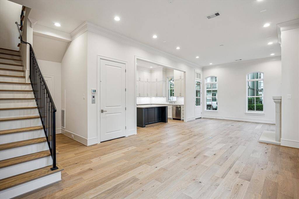 Spacious open living/kitchen area located on first floor with beautiful French Oak 7" wide engineered wood flooring.