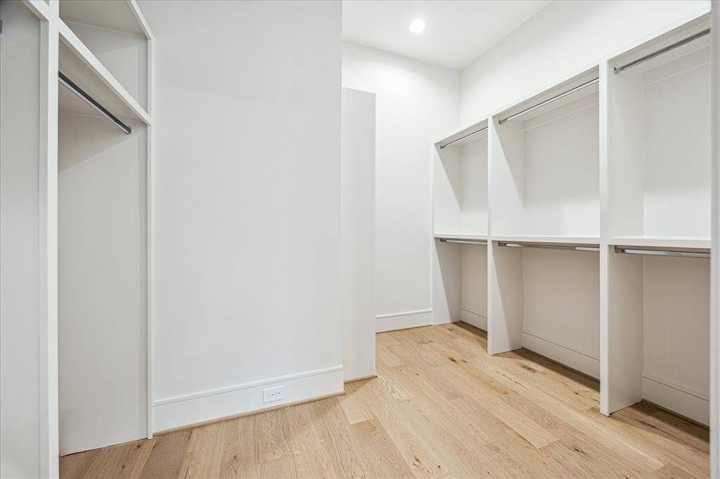 Her walk-in closet in the primary suite.