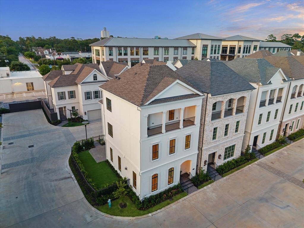 Notice the side yard with access to first floor living area.  A rare find.