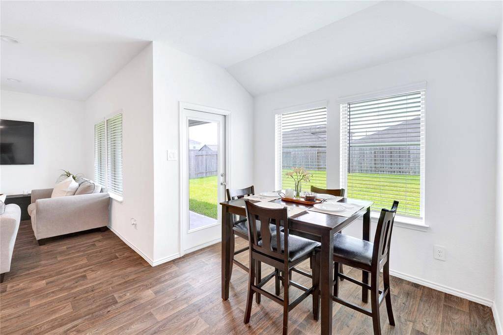 Spacious dining area leading to back patio