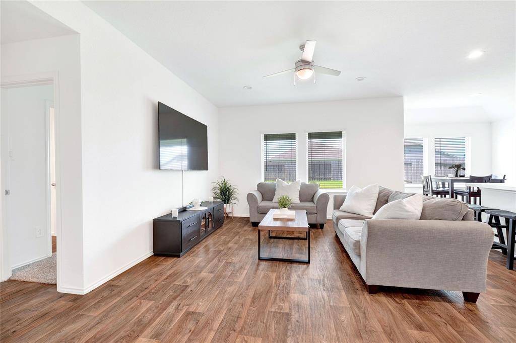 Full blinds and 12 foot ceilings