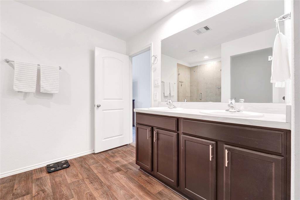 Includes Double sinks and towel racks