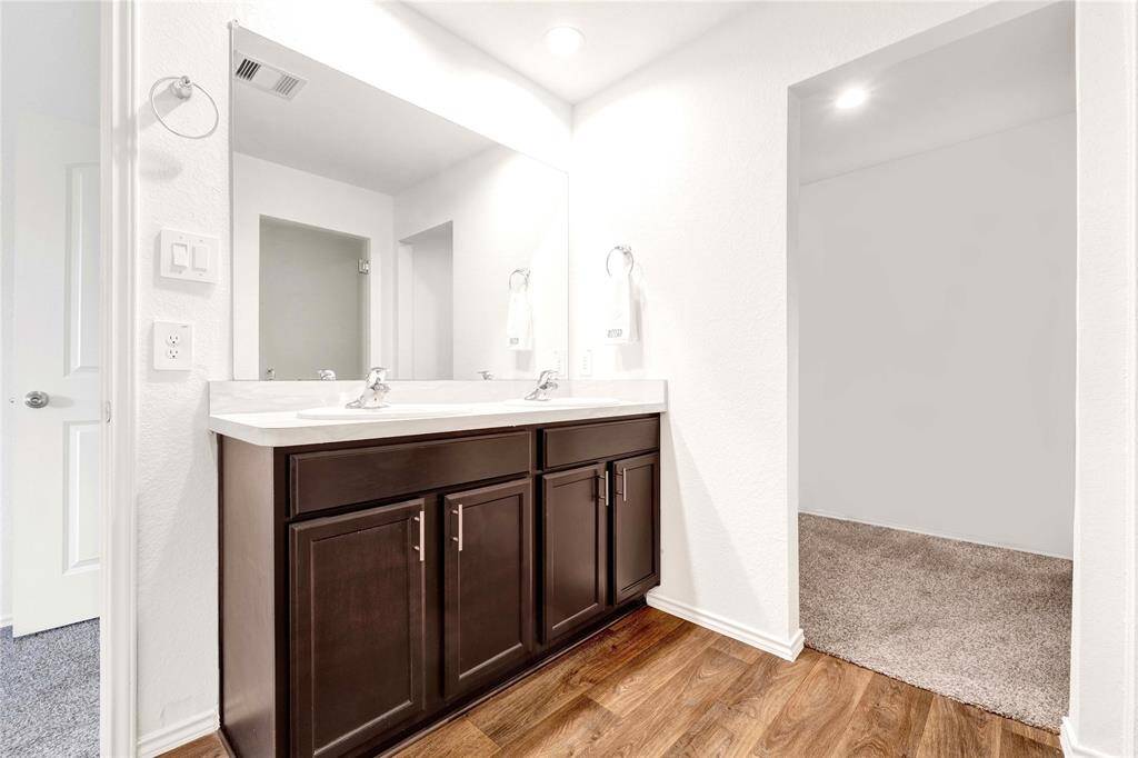 Primary bathroom leads to large walk in closet