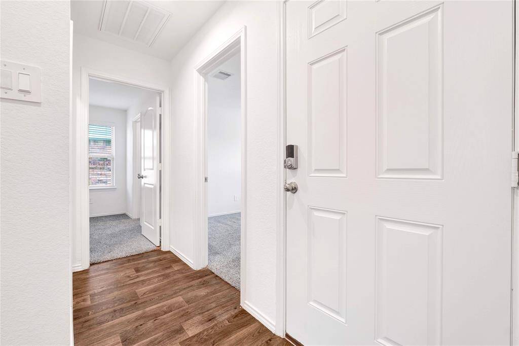 Two secondary bedrooms to the right of hallway